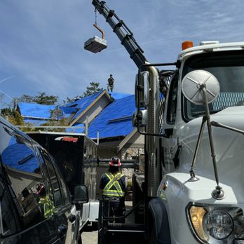 Noble Roofing - Noble Roofing loading a roof with roofing supplies in Victoria - Roofing Near Me - Victoria, British Columbia Noble Roofing - Noble Roofing loading a roof with roofing supplies in Victoria - Roofing Near Me - Victoria, British Columbia