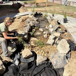 Crider Landscaping - Water feature for a courtyard garden being installed in Lakesite
