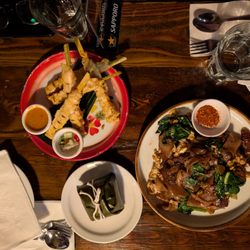 Pai Northern Thai Kitchen - Chicken skewers, pad see ew with beef, sticky rice