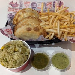 The Empanada Maker - Combo #3 (3 Empanadas, Seasoned Fries), extra side of Chimichurri Rice, Chimichurri Sauce, Cilantro Avocado Sauce