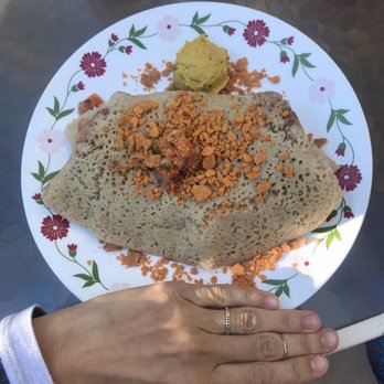 ChocolaTree - Dosa Burrito with Vegan Paneer - hand for scale! - Vegetarian Near Me - Sedona, Arizona ChocolaTree - Dosa Burrito with Vegan Paneer - hand for scale! - Vegetarian Near Me - Sedona, Arizona