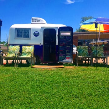 Bon Cheri - a vintage camper parked in the grass - Ice Cream & Frozen Yogurt Near Me - Tulsa, Oklahoma