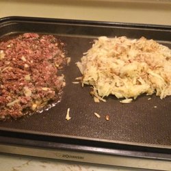 Dennis' nofrills - .. lean ground beef & shredded raw potato on the griddle.