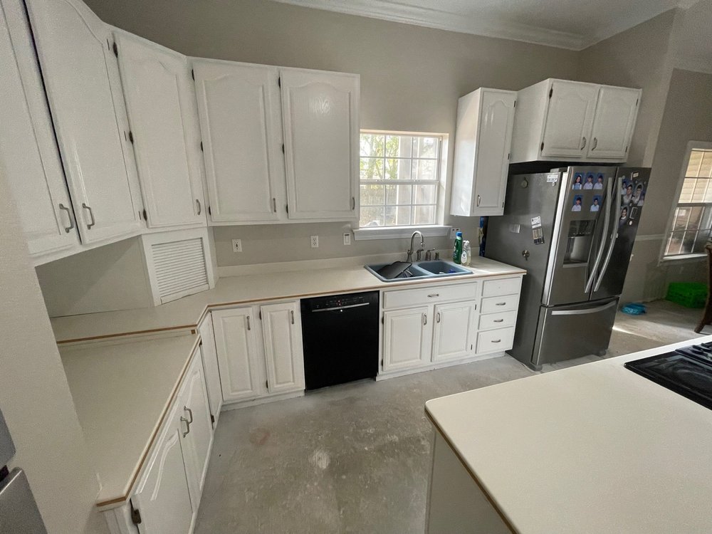 Slide of Blue Ladder Renovations & Repairs