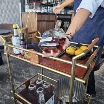 Nova Lounge - Bartender making the Parallax (old fashion) table side. - Lounges Near Me - Oklahoma City, Oklahoma