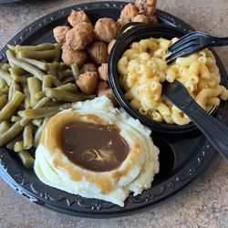 Nishie G's Cafe - Green beans fried okra. Mac n cheese mashed potatoes w/ gravy