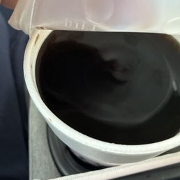 Non iced flat hot Dr Pepper.