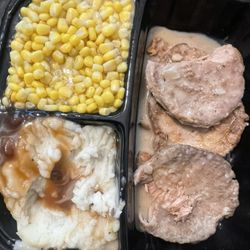 Smothered Pork Chops, Sweet Corn, Mashed Potatoes and gravy