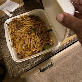 Chan's Chinese Restaurant - a hand holding a box of noodles - Chinese Near Me - Mesquite, Texas Chan's Chinese Restaurant - a hand holding a box of noodles - Chinese Near Me - Mesquite, Texas