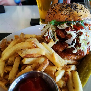 Trust - Fried Chicken Sandwich | Cabbage | Mayo | Ssäm Sauce | Cilantro | House Chili | Pickles | Poppy Seed Bun | Fries - New American Near Me - San Diego, California