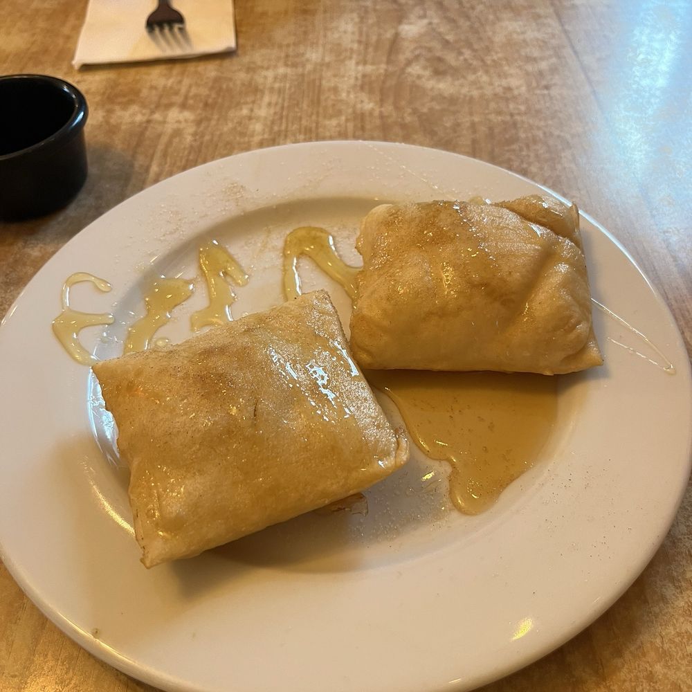 Sopapillas were delicious and served with honey or chocolate or how you prefer Sopapillas were delicious and served with honey or chocolate or how you prefer