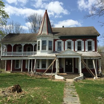 ONE Remodeling - a red and white house with a steeple - General Contractors Near Me ONE Remodeling - a red and white house with a steeple - General Contractors Near Me