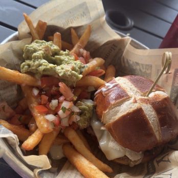 Ralston's Drafthouse - Mushroom Swiss Burger on pretzel bun, with yogi fries! - Gastropubs Near Me - Indianapolis, Indiana Ralston's Drafthouse - Mushroom Swiss Burger on pretzel bun, with yogi fries! - Gastropubs Near Me - Indianapolis, Indiana