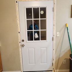 Smith's Handyman Services - New door properly installed and insulated. (Before trim was put back on)