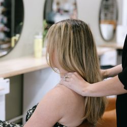 Posh Salon And Boutique - Enjoy our signature essential oil neck and shoulder massage with every hair service