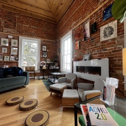 Kismet Books - Lounge upstairs with fireplace and seating for kids