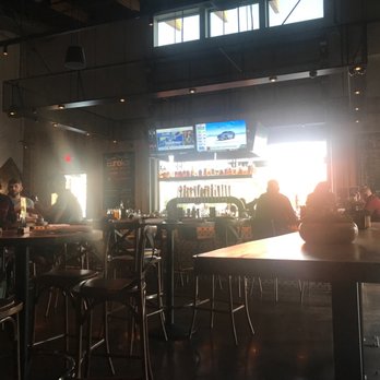 Eureka! - Bar area with a view of the outdoor seating - American Near Me - Roseville, California Eureka! - Bar area with a view of the outdoor seating - American Near Me - Roseville, California