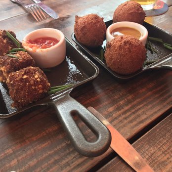 Bosscat Kitchen & Libations - Meatloaf and Pulled Pork Hushpuppies - New American Near Me - Irvine, California Bosscat Kitchen & Libations - Meatloaf and Pulled Pork Hushpuppies - New American Near Me - Irvine, California