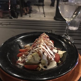 Fireside Pizza Cafe - Blue Cheese Wedge Salad .... drips of balsamic glaze makes this dish so wonderful. - Pizza Near Me - Palm Harbor, Florida Fireside Pizza Cafe - Blue Cheese Wedge Salad .... drips of balsamic glaze makes this dish so wonderful. - Pizza Near Me - Palm Harbor, Florida