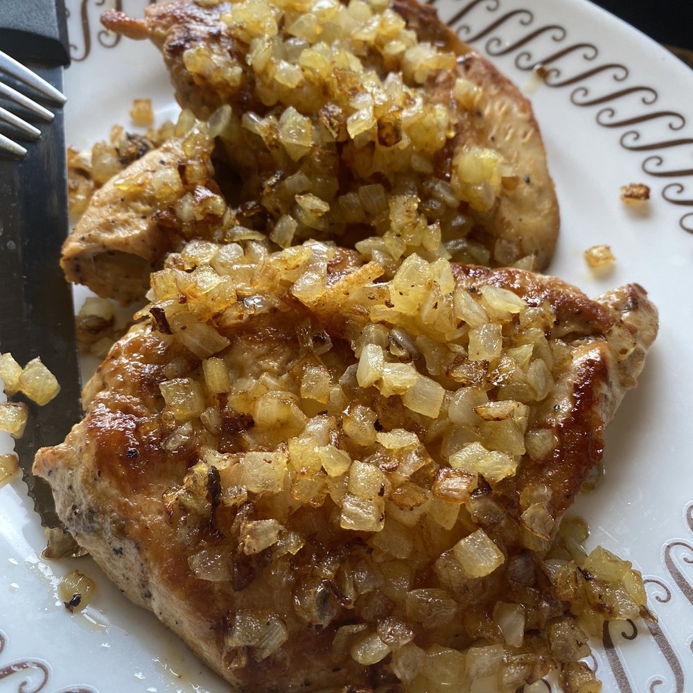 Perfectly executed chicken with grilled onions.