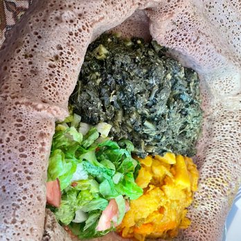 Asmara - Sauteed Spinach with veggies in mild yellow stew - African Near Me - Portland, Maine