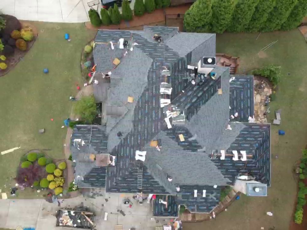 Slide of Topps Roofing & Construction