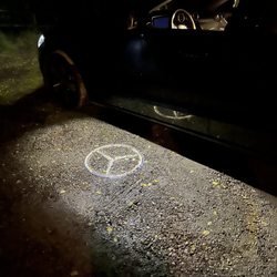 Europcar - My car rental projects the Mercedes logo onto the ground