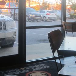 East Coast Wings + Grill - Windows were filthy. Can't see how bad they were in photos, but streaks and hand prints all along where the truck grille is and along side.