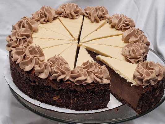 Saras Goodies - a chocolate cake with a slice taken out of it - Martinsville, IN Saras Goodies - a chocolate cake with a slice taken out of it - Martinsville, IN
