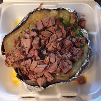 Stockyard Bar BQ - Stuffed spud with brisket - Barbeque Near Me - Houston, Texas Stockyard Bar BQ - Stuffed spud with brisket - Barbeque Near Me - Houston, Texas