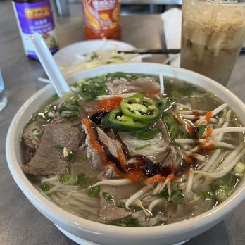 Booboo Pho - Steak/brisket pho all dressed up- I'm getting sick of the fake sriracha. Hope they start making it again soon. - Vietnamese Near Me - Montgomery Village, Maryland