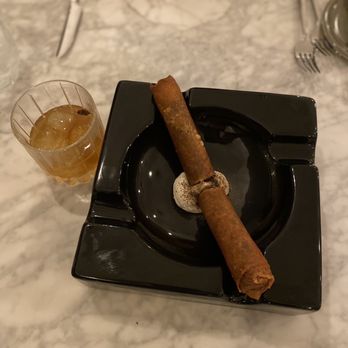 Larsen - Short rib cigar appetizer (so cute)! And the tequila, honey, grapefruit bitters drink. Both are must haves. - Cocktail Bars Near Me - Laguna Beach, California