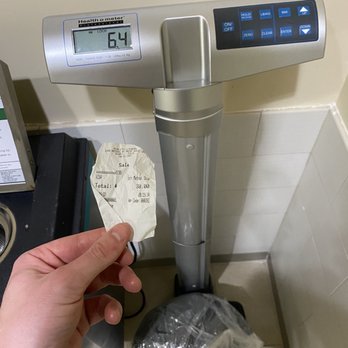 Anjali Dry Cleaners - Receipt of $30 (10 pounds worth of clothes based on pricing). Actual weight on scale screen. - Dry Cleaning Near Me - Miami, Florida