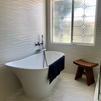 New Empire Design Center - Tile wall surrounds tub & shower area, goes to ceiling - Flooring Near Me - Lake Elsinore, California