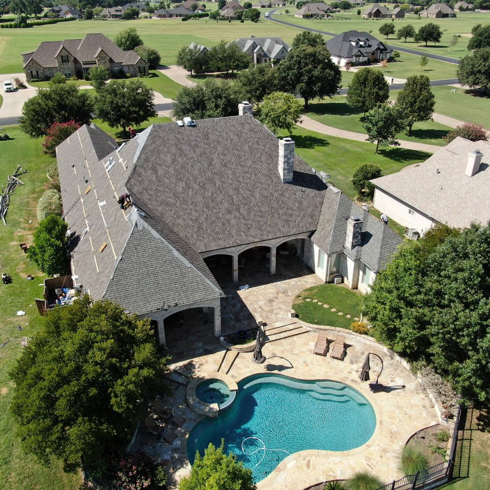 Slide of AIM Roofing