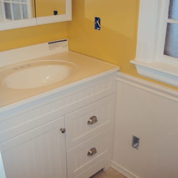 RW Drew Construction - a bathroom with yellow walls - General Contractors Near Me - Lovell, Maine RW Drew Construction - a bathroom with yellow walls - General Contractors Near Me - Lovell, Maine