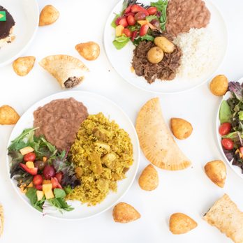 GrillZil - a variety of mexican food on plates - Brazilian Near Me - Jonesboro, Arkansas