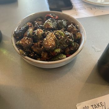 Sixty Vines - BRUSSELS crisp fried, kung pao vinaigrette, scallions, cashews - New American Near Me - Charlotte, North Carolina