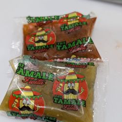 The Tamale Fiesta - House made green and red sauce, rarely see them in their own packaging like this