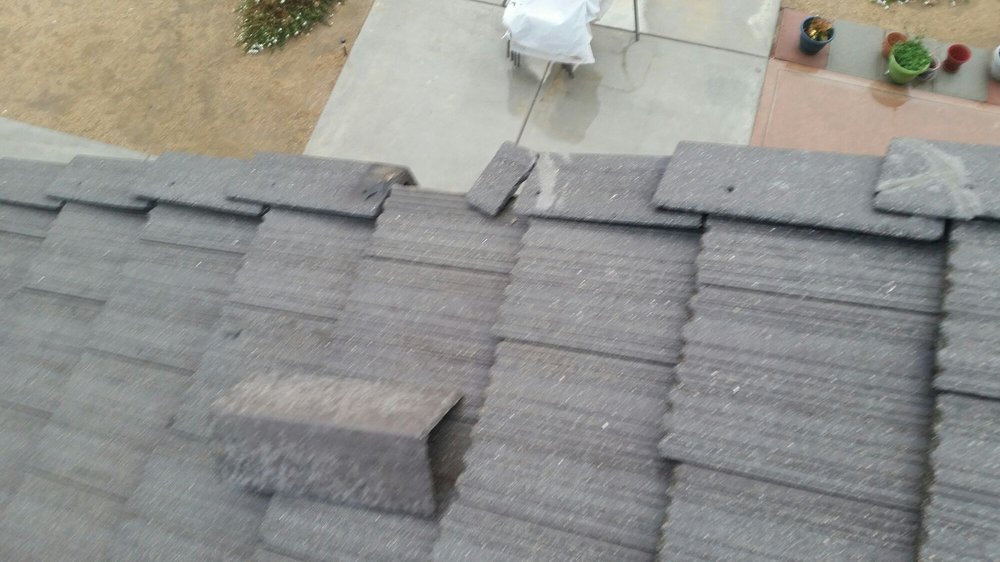 Slide of Am Roofing