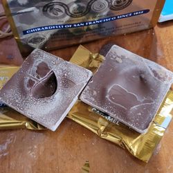 Edible Arrangements - Old/incorrectly stored Girardelli caramel chocolate squares sent along with an arrangement. Compar with the picture of squares on the bag.