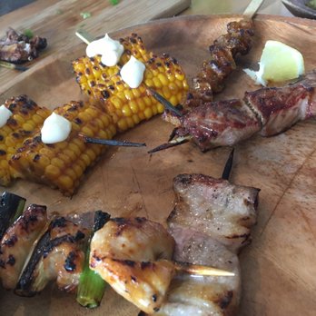 Oak & Coal - Charcoal grilled Korumbuto pork belly, Wague beef, corn, zucchini, shrimp, scallops. Amazing sauces and garlic noodles      Were wonderful!! - Japanese Near Me - Costa Mesa, California