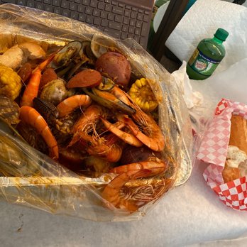 Dragon's Crawfish - My order of the $55 combo with shrimp, clams, crab, mussels, potato, corn and sausage. W/ bread on the side. (Ginger ale not included) lol - Cajun/Creole Near Me - Tacoma, Washington Dragon's Crawfish - My order of the $55 combo with shrimp, clams, crab, mussels, potato, corn and sausage. W/ bread on the side. (Ginger ale not included) lol - Cajun/Creole Near Me - Tacoma, Washington