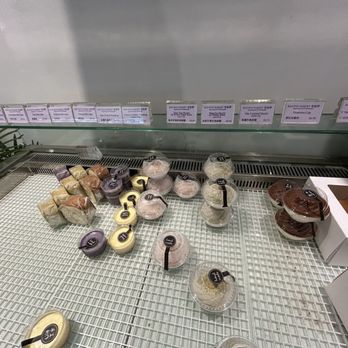 Bao Bao Bakery & Cafe - All the yummy goodies. This was an hour before closing time, you can see many goodies are gone. - Bakeries Near Me - Boston, Massachusetts