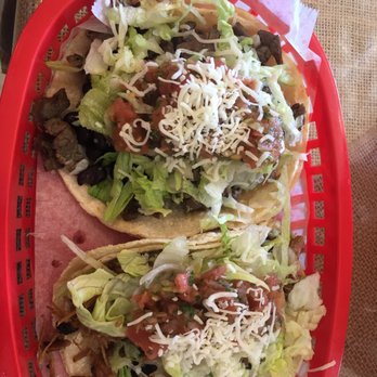 BKK Mexican & Thai  - Carne asada and carnitas tacos. All of these toppings are included in the normal taco! Carnitas taco was especially delicious - Mexican Near Me - Berkeley, California