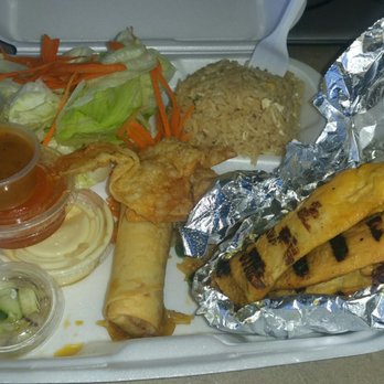 Cha Thai Restaurant - Chicken satay. Overcooked chicken. Smallest amount of satay sauce I've ever received (the cup smaller than the salad dressing cup) - Thai Near Me - Orange, California