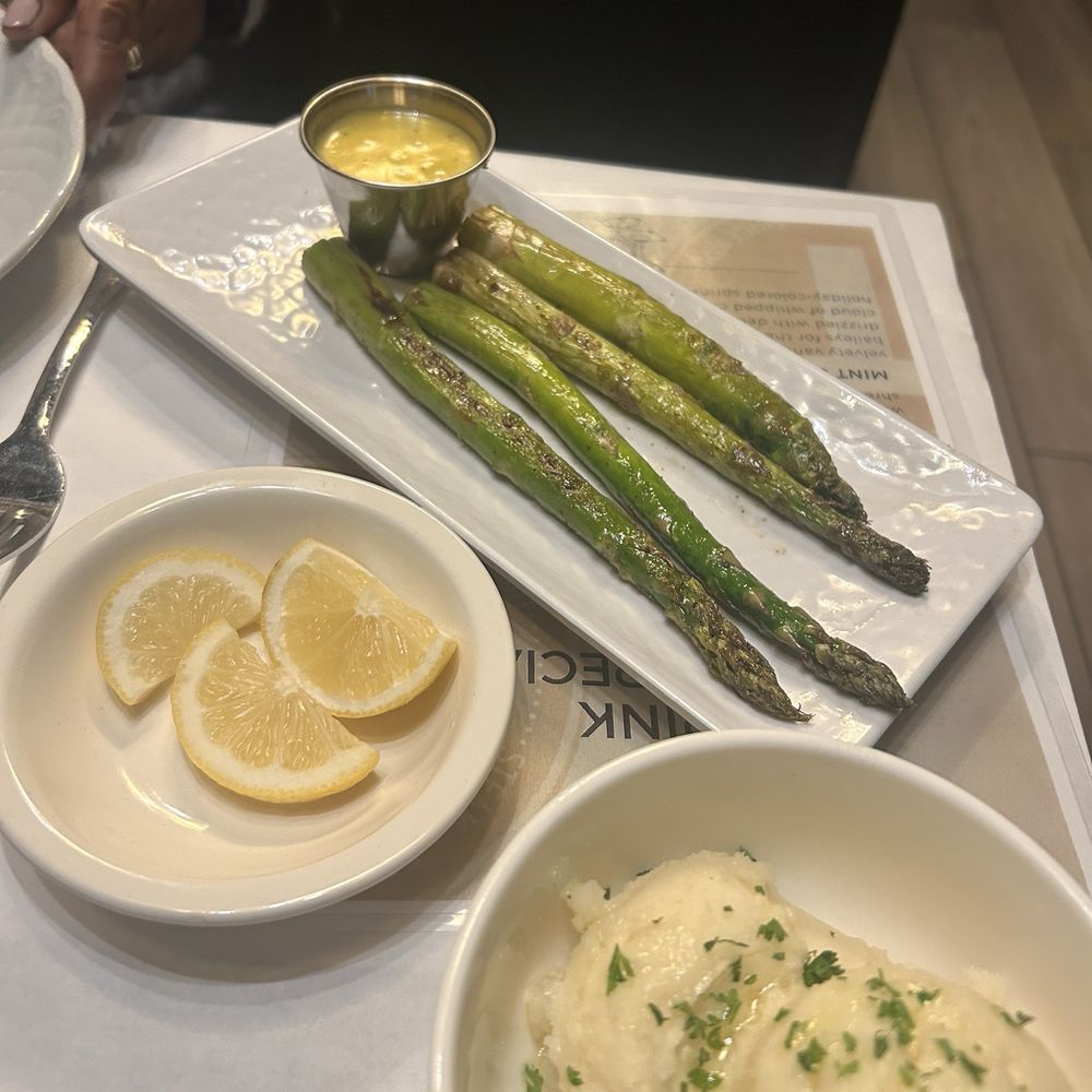 Theo's Steaks & Seafood - Grilled Asparagus and Mashed Potato - Seafood Near Me - Highland, Indiana Theo's Steaks & Seafood - Grilled Asparagus and Mashed Potato - Seafood Near Me - Highland, Indiana
