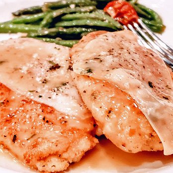 Andiamo - Sicilian breaded chicken breasts with zip sauce all over it! - Italian Near Me - Warren, Michigan
