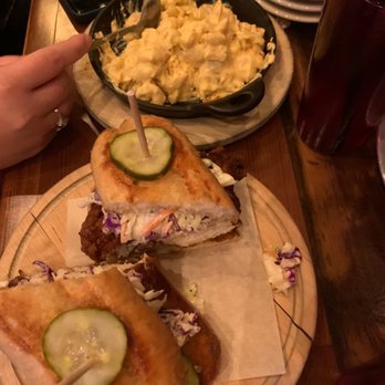 The Eagle Charlotte - Fried Chicken Sandwich comes topped with coleslaw - Southern Near Me - Charlotte, North Carolina The Eagle Charlotte - Fried Chicken Sandwich comes topped with coleslaw - Southern Near Me - Charlotte, North Carolina