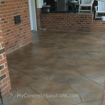 Creative Concrete Solutions - Custom stone pattern overlay on patio. - Refinishing Services Near Me